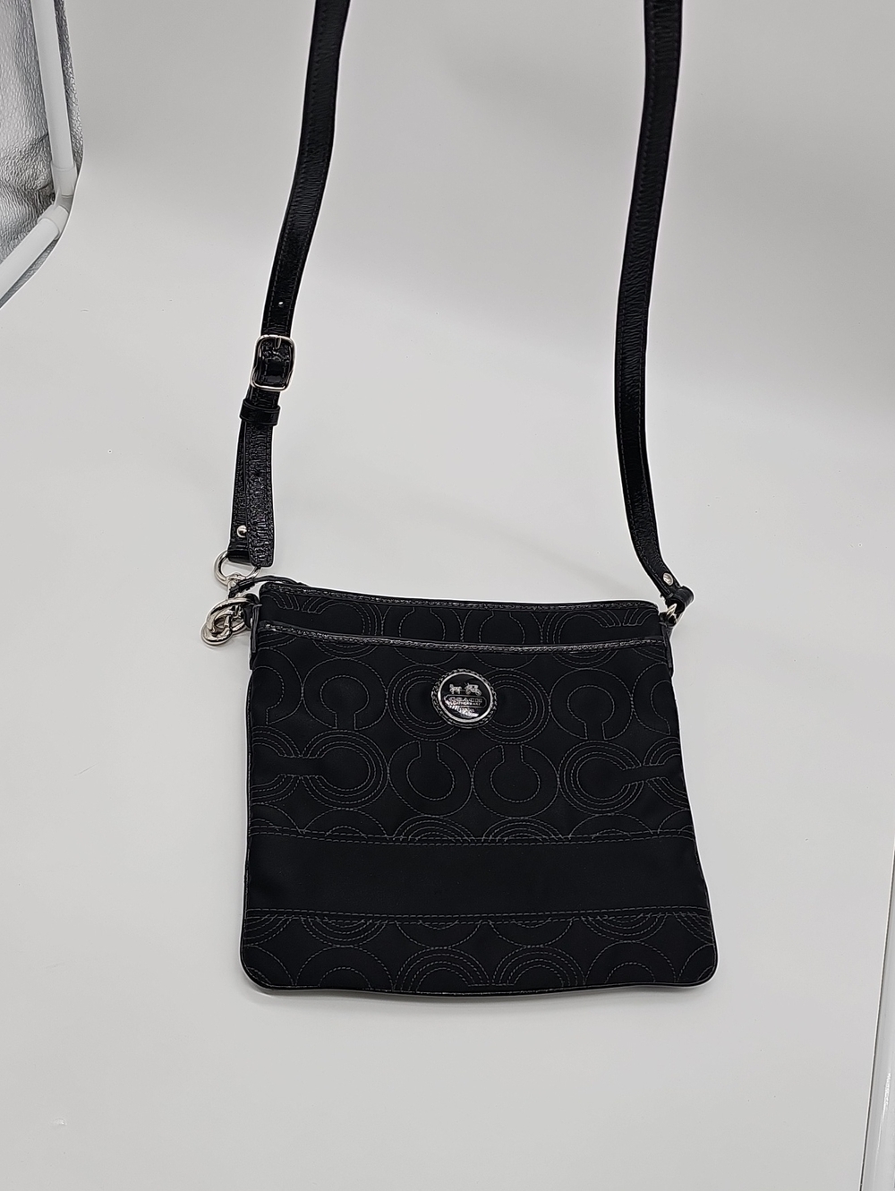 Coach Black Crossbody with Signature Circular Stitch Detail